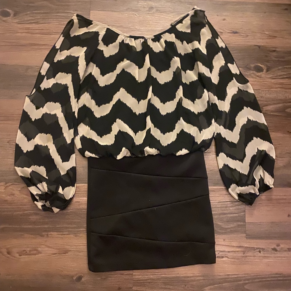 Extremely flattering dress- flow top with tight bottom